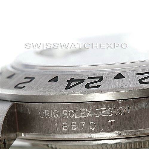 The image shows a close-up of the bezel and case side engraving of the Rolex Explorer 16570 Men's Stainless Steel Black Dial 16570 Men's Stainless Steel Black Dial model 16570.