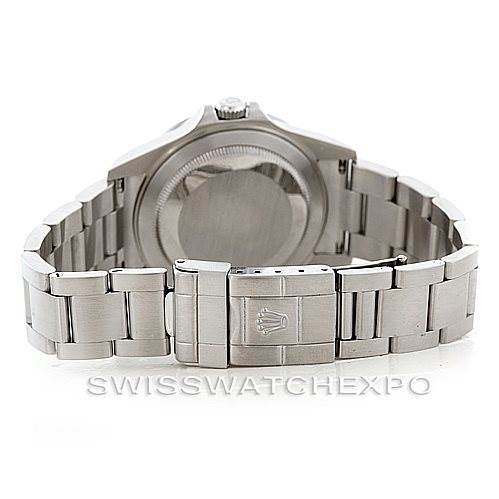 The image shows the rear view of the Rolex Explorer 16570 Men's Stainless Steel Black Dial 16570 Men's Stainless Steel Black Dial model, focusing on the case back and stainless steel bracelet.