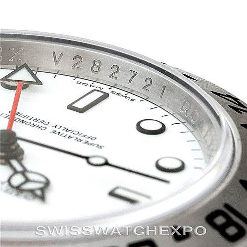 Close-up of the Rolex Explorer 16570 Men's Stainless Steel White Dial 16570 Men's Stainless Steel White Dial watch showing the dial, bezel, and part of the serial number.