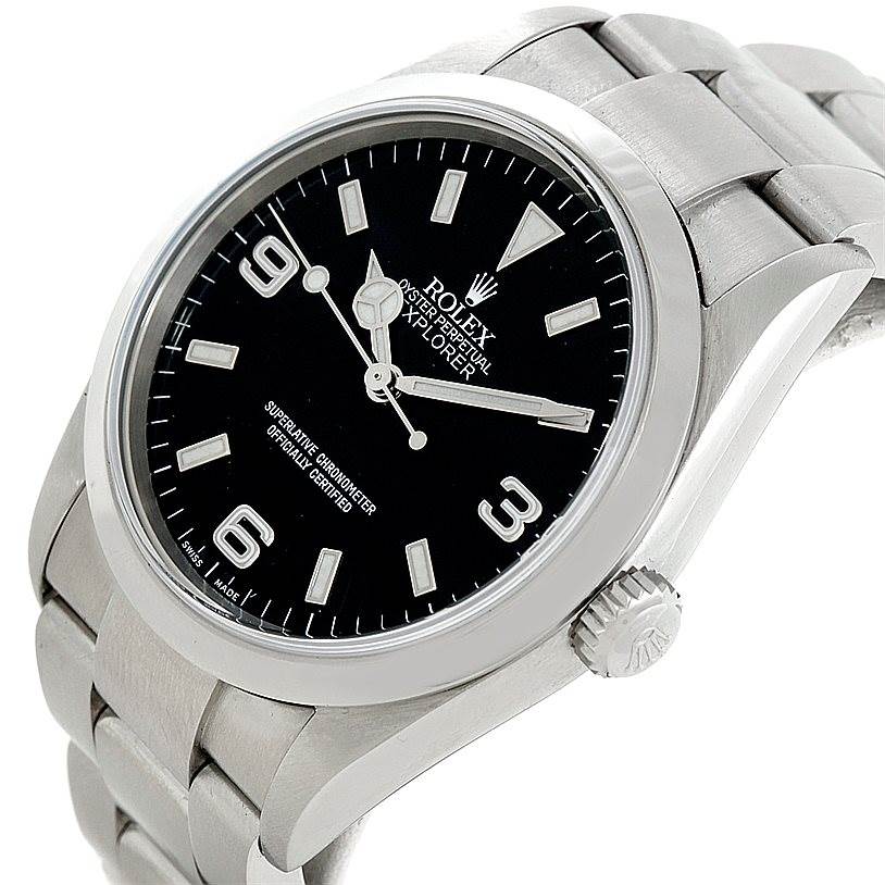 This image shows a close-up of the Rolex Explorer 114270 Men's Stainless Steel Black Dial 114270 Men's Stainless Steel Black Dial model, focusing on the face, crown, and part of the bracelet.