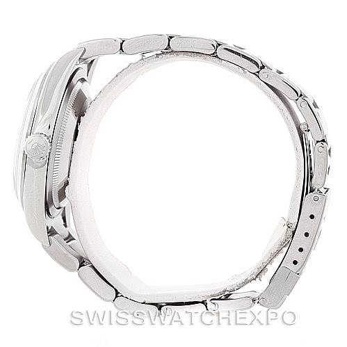 Side view of the Rolex Explorer 114270 Men's Stainless Steel Black Dial 114270 Men's Stainless Steel Black Dial, showing the case, crown, and part of the bracelet.