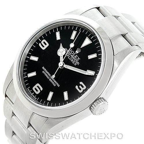 The Rolex Explorer 114270 Men's Stainless Steel Black Dial 114270 Men's Stainless Steel Black Dial watch is displayed from an angled front view, showing its black dial, stainless steel case, crown, and part of the bracelet.
