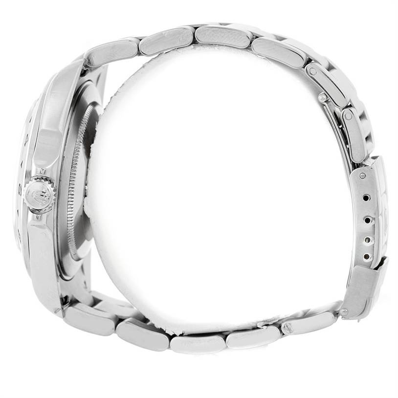 The image shows the side view of a Rolex Explorer 16570 Men
s Stainless Steel Black Dial 16570 Men
s Stainless Steel Black Dial model, highlighting its case, crown, and metal bracelet.