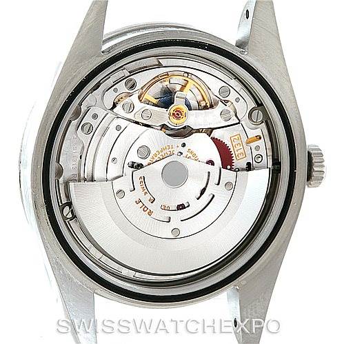 This image shows the internal mechanism and movement of a Rolex Explorer 214270 Men's Stainless Steel Black Dial 214270 Men's Stainless Steel Black Dial model watch from a direct rear angle.