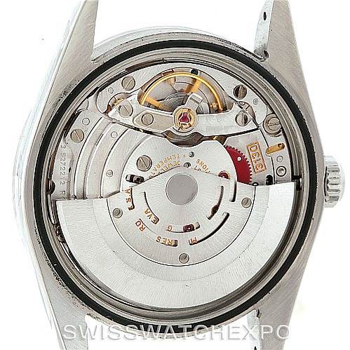 The image shows the back view of a Rolex Explorer 114270 Men's Stainless Steel Black Dial 114270 Men's Stainless Steel Black Dial model, revealing its internal mechanical movement.