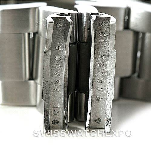 This close-up image shows the clasp components of a Rolex Explorer 16570 Men's Stainless Steel Black Dial 16570 Men's Stainless Steel Black Dial watch with the reference number CL 78790 A engraved.