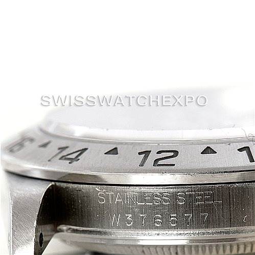 This close-up image shows the bezel and part of the case with engravings on a Rolex Explorer 16570 Men's Stainless Steel Black Dial 16570 Men's Stainless Steel Black Dial watch.