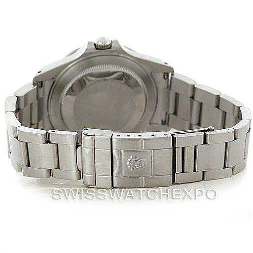 The image shows the back view of a Rolex Explorer 16570 Men
s Stainless Steel White Dial 16570 Men
s Stainless Steel White Dial watch, focusing on its case back and bracelet with a clasp.