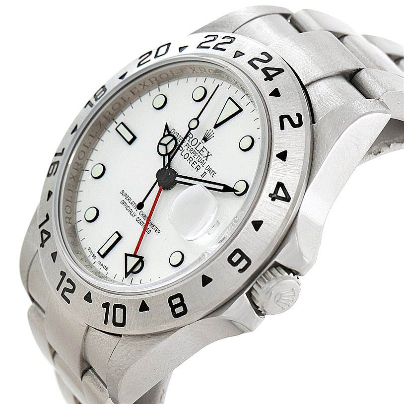 This is a close-up of the Rolex Explorer 16570 Men's Stainless Steel White Dial 16570 Men's Stainless Steel White Dial watch showing the dial, bezel, crown, and part of the bracelet from an angled side view.