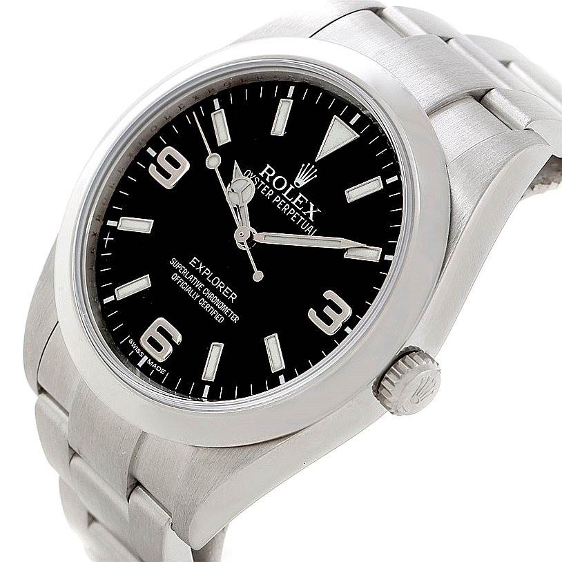 The Rolex Explorer 214270 Men's Stainless Steel Black Dial 214270 Men's Stainless Steel Black Dial watch is shown at an angle highlighting its black dial, stainless steel case, and part of the bracelet.