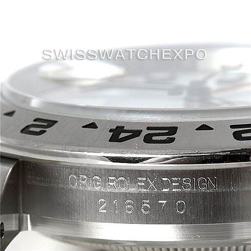 This image shows a close-up side view of the Rolex Explorer 216570 Men
s Stainless Steel White Dial 216570 Men
s Stainless Steel White Dial
s bezel and case, featuring the model number 216570.