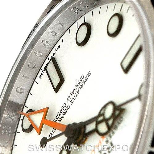This close-up angle shows the dial, some hour markers, and parts of the Rolex Explorer 216570 Men
s Stainless Steel White Dial 216570 Men
s Stainless Steel White Dial model’s hands and bezel.