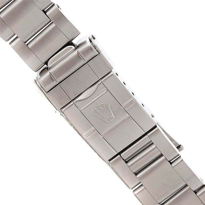 This image shows a close-up of the clasp and bracelet of the Rolex Explorer 16570 Men's Stainless Steel White Dial 16570 Men's Stainless Steel White Dial watch at an angled view.