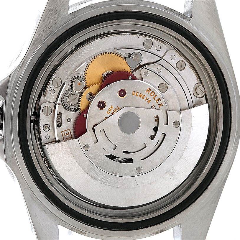 This is a close-up view of the Rolex Explorer 16570 Men's Stainless Steel White Dial 16570 Men's Stainless Steel White Dial's movement, showcasing its internal mechanical parts and engraving.