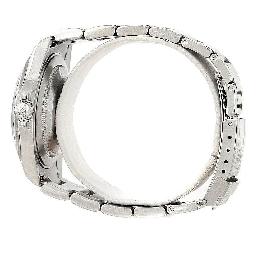 This side-angle view of the Rolex Explorer 16570 Men's Stainless Steel White Dial 16570 Men's Stainless Steel White Dial watch shows the bracelet, housing, and crown.