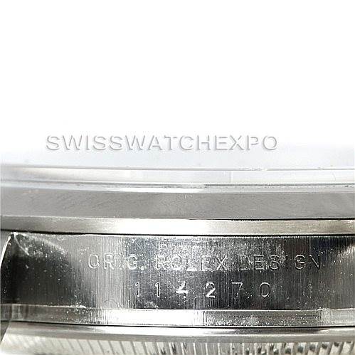 Close-up of the side engraving on the casing of a Rolex Explorer 114270 Men's Stainless Steel Black Dial 114270 Men's Stainless Steel Black Dial watch, showing model number 14270 and “ORIG. ROLEX DESIGN” text.