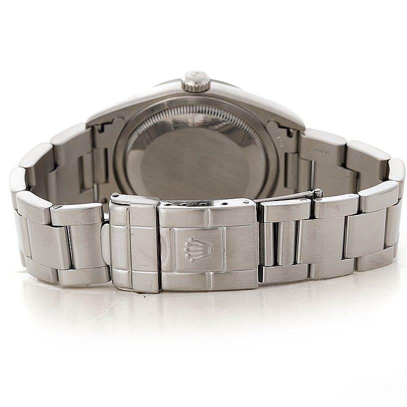 The image shows the back view of a Rolex Explorer 14270 Men's Stainless Steel Black Dial 14270 Men's Stainless Steel Black Dial watch, highlighting the case back and metal bracelet with the Rolex clasp.