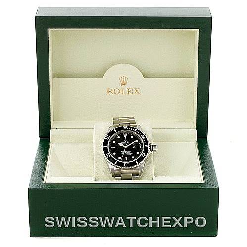 The image shows a Rolex Explorer 16570 Men
s Stainless Steel White Dial 16570 Men
s Stainless Steel White Dial watch viewed from the front, displayed in its original green and white box.