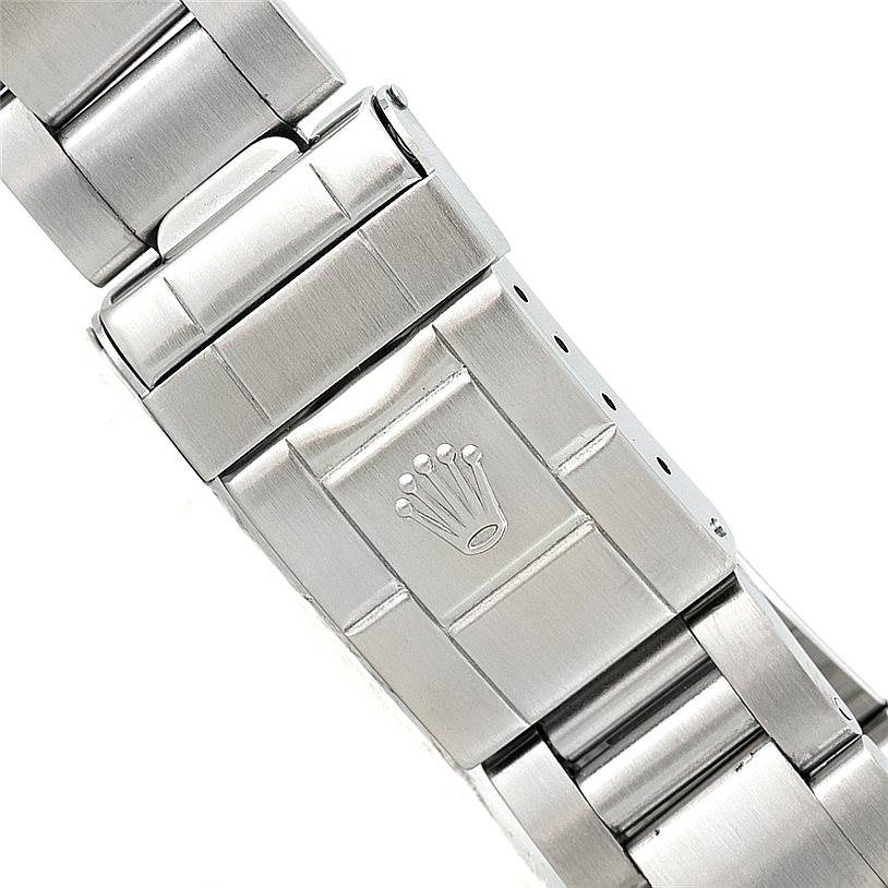 The image shows a close-up of the clasp on a Rolex Explorer 16570 Men's Stainless Steel White Dial 16570 Men's Stainless Steel White Dial watch bracelet.