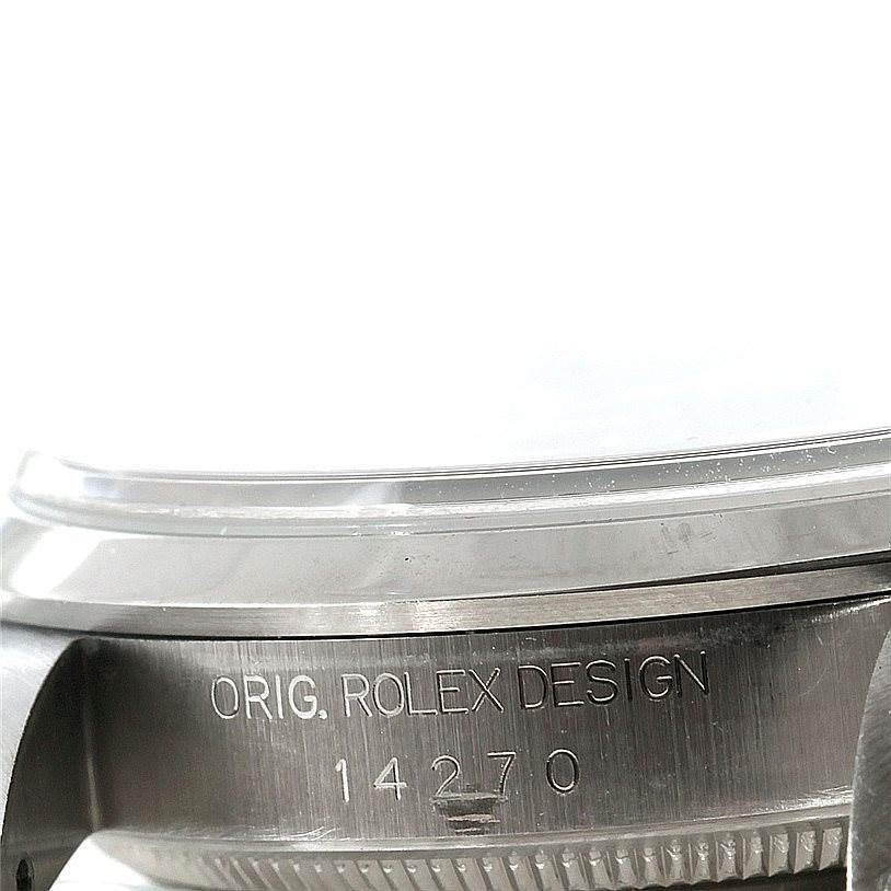 This image shows a close-up of the side of a Rolex Explorer 14270 Men's Stainless Steel Black Dial 14270 Men's Stainless Steel Black Dial watch case, featuring the model number "14270" inscription.