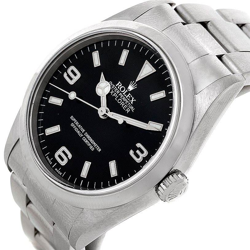 This image shows a Rolex Explorer 14270 Men's Stainless Steel Black Dial 14270 Men's Stainless Steel Black Dial watch from an angled top view, highlighting the dial, crown, and part of the bracelet.