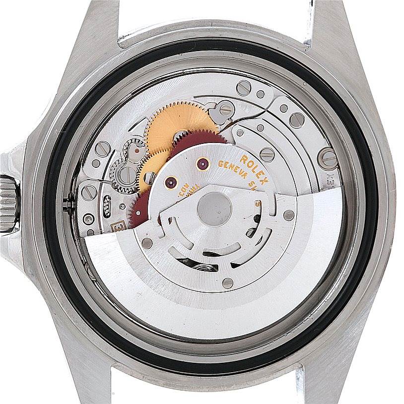 The image shows the back view of a Rolex Explorer 16570 Men's Stainless Steel Black Dial 16570 Men's Stainless Steel Black Dial watch, revealing its internal movement components.
