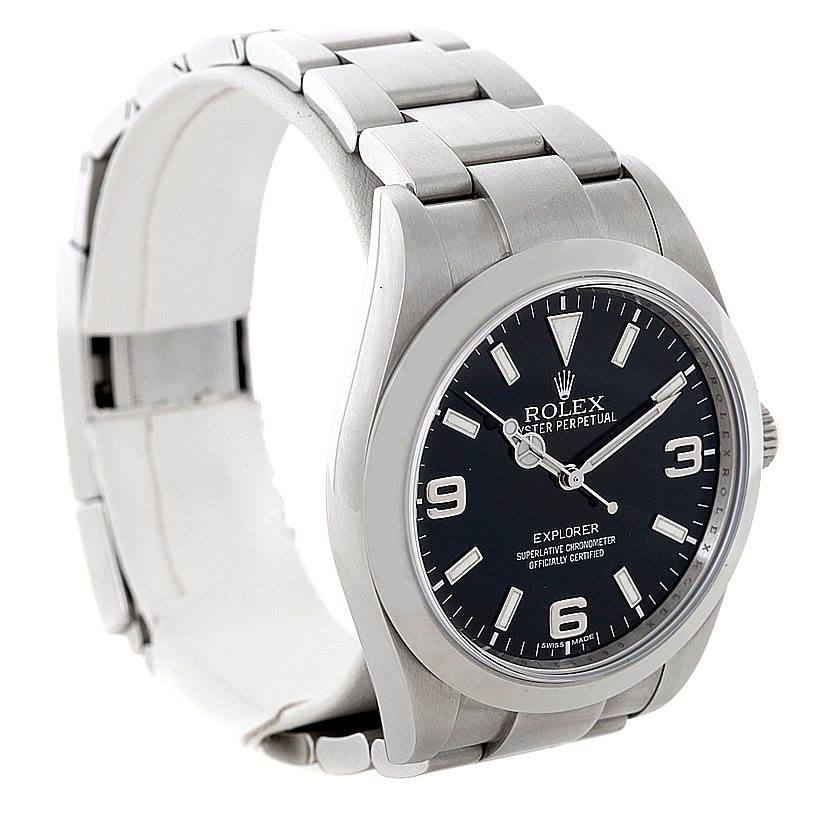 The image shows a front and side view of a Rolex Explorer 214270 Men's Stainless Steel Black Dial 214270 Men's Stainless Steel Black Dial watch, emphasizing the face, bezel, bracelet, and clasp.