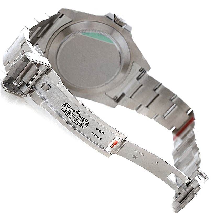 The image shows the case back and open clasp of a Rolex Explorer 216570 Men's Stainless Steel White Dial 216570 Men's Stainless Steel White Dial watch, highlighting its bracelet and clasp mechanism.