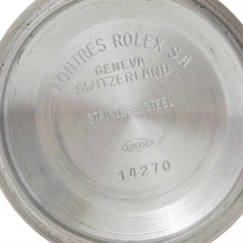 This image shows the interior case back of a Rolex Explorer 14270 Men's Stainless Steel Black Dial 14270 Men's Stainless Steel Black Dial model watch, displaying inscriptions including "Geneva Switzerland" and "14270".