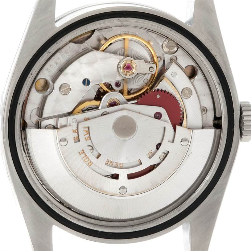 The image shows the internal mechanism of a Rolex Explorer 14270 Men's Stainless Steel Black Dial 14270 Men's Stainless Steel Black Dial watch taken from the back, displaying its intricate movement components.