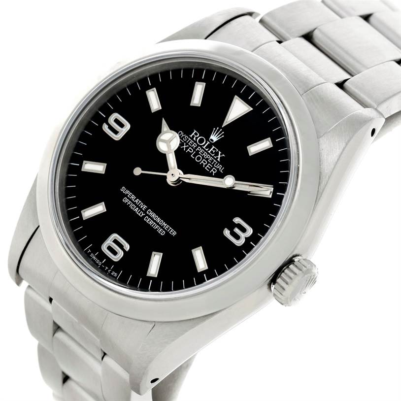 The image shows a close-up of a Rolex Explorer 14270 Men's Stainless Steel Black Dial 14270 Men's Stainless Steel Black Dial watch, highlighting the black dial, hour markers, and stainless steel bracelet.