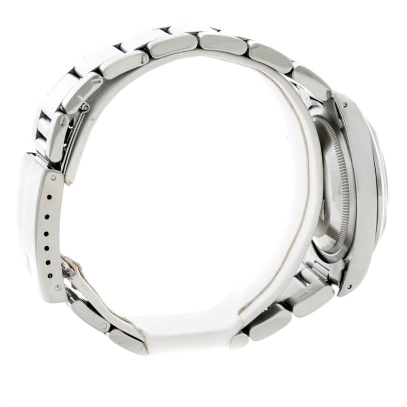 This image shows a side view of a Rolex Explorer 14270 Men's Stainless Steel Black Dial 14270 Men's Stainless Steel Black Dial watch, focusing on the bracelet, clasp, and case.