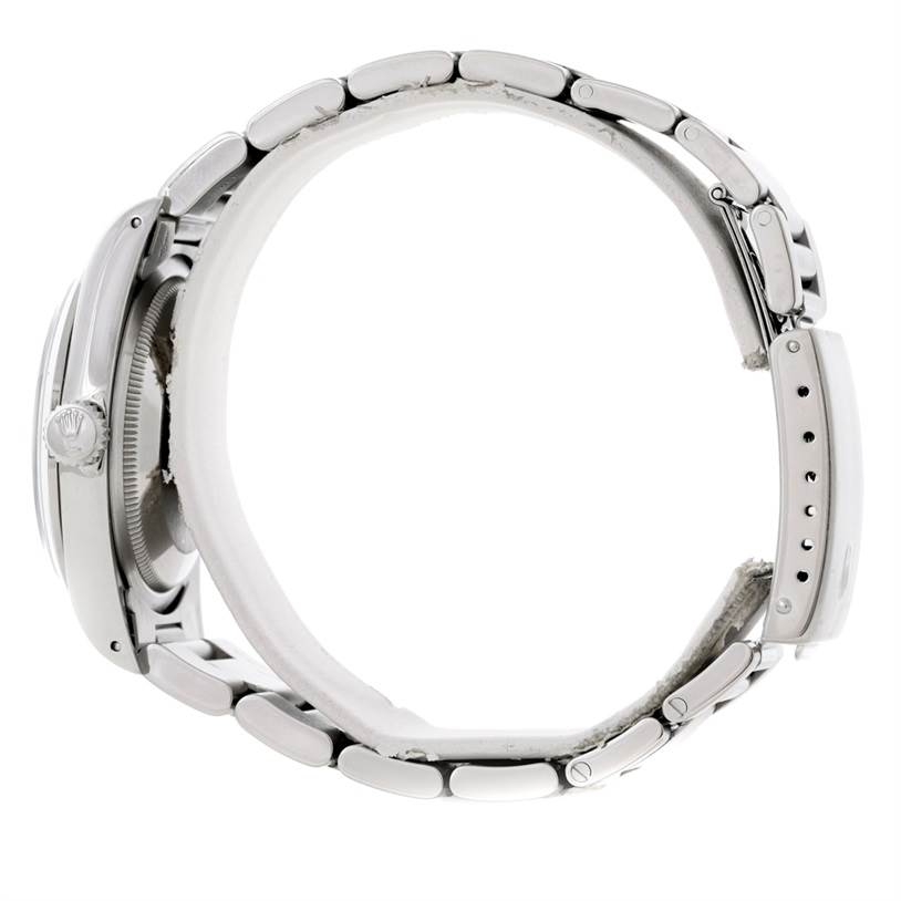 The image shows a side view of the Rolex Explorer 14270 Men's Stainless Steel Black Dial 14270 Men's Stainless Steel Black Dial watch, highlighting the band and case.