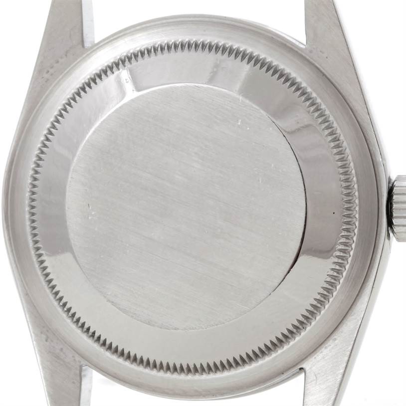 This image shows the back case and part of the crown of a Rolex Explorer 14270 Men's Stainless Steel Black Dial 14270 Men's Stainless Steel Black Dial watch.