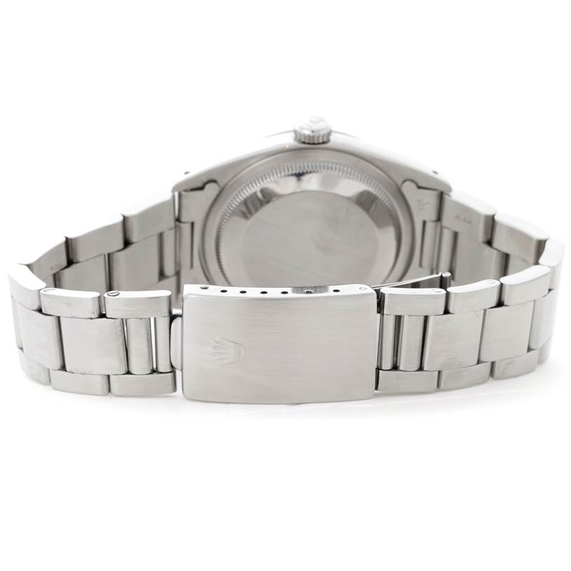 This image shows the stainless steel bracelet, clasp, and case back of a Rolex Explorer 14270 Men's Stainless Steel Black Dial 14270 Men's Stainless Steel Black Dial watch from the rear angle.