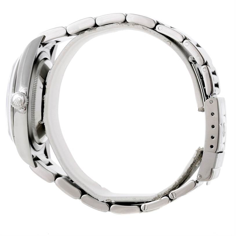 This image shows the side view of a Rolex Explorer 114270 Men's Stainless Steel Black Dial 114270 Men's Stainless Steel Black Dial watch, focusing on the band, clasp, and partially visible crown.