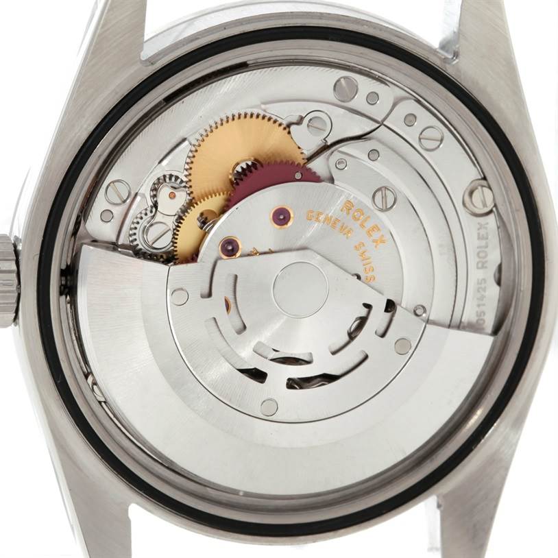 This image shows a close-up view of the internal mechanism of a Rolex Explorer 114270 Men's Stainless Steel Black Dial 114270 Men's Stainless Steel Black Dial watch from the back case.