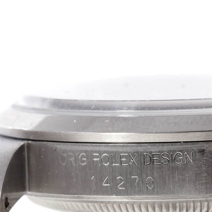 This image shows the side view of a Rolex Explorer 14270 Men's Stainless Steel Black Dial 14270 Men's Stainless Steel Black Dial watch, highlighting the bezel and the engraved model number 14270.