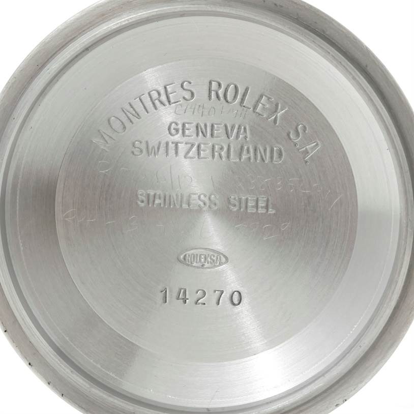 The image shows the inside case back of a Rolex Explorer 14270 Men's Stainless Steel Black Dial 14270 Men's Stainless Steel Black Dial model, displaying "Montres Rolex S.A." and model number "14270."