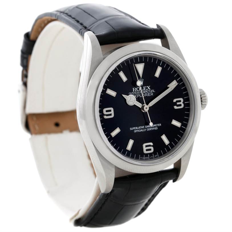 The Rolex Explorer 14270 Men's Stainless Steel Black Dial 14270 Men's Stainless Steel Black Dial watch is shown at a slight side angle, displaying the face, bezel, and leather strap.