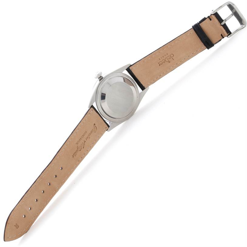 The image shows the back and strap of a Rolex Explorer 14270 Men's Stainless Steel Black Dial 14270 Men's Stainless Steel Black Dial watch, highlighting the leather band and the case back.