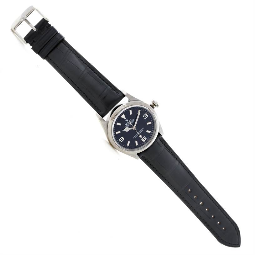 The image shows a Rolex Explorer 14270 Men's Stainless Steel Black Dial 14270 Men's Stainless Steel Black Dial watch, angled diagonally, displaying its dial, case, crown, and black leather strap.