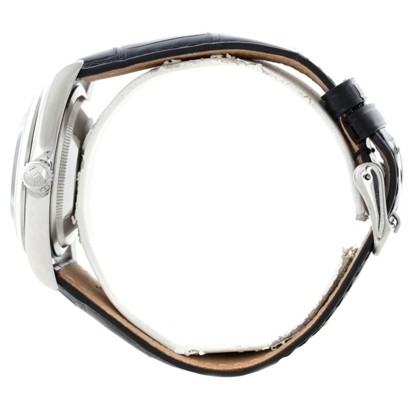 The image shows a side profile of a Rolex Explorer 14270 Men's Stainless Steel Black Dial 14270 Men's Stainless Steel Black Dial, highlighting its crown, case, and leather strap with clasp.