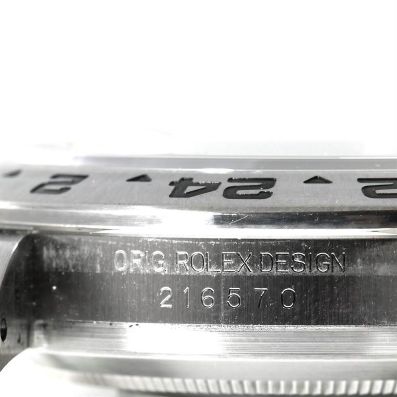 This image shows a close-up view of the side engraving on a Rolex Explorer 216570 Men
s Stainless Steel White Dial 216570 Men
s Stainless Steel White Dial watch, displaying the model number 216570.