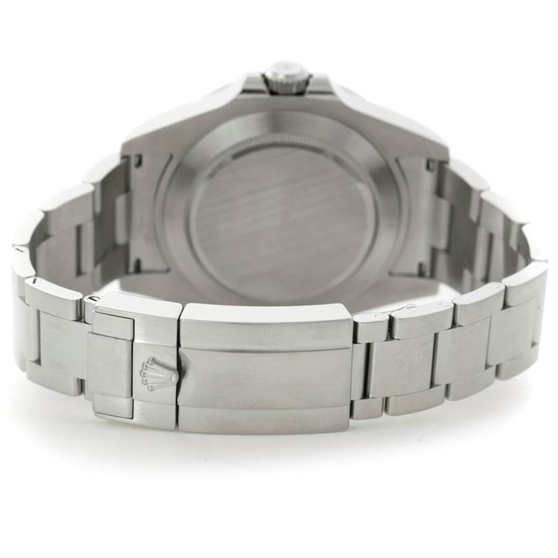 The image features the back view of a Rolex Explorer 216570 Men
s Stainless Steel White Dial 216570 Men
s Stainless Steel White Dial watch, showcasing its clasp and bracelet.