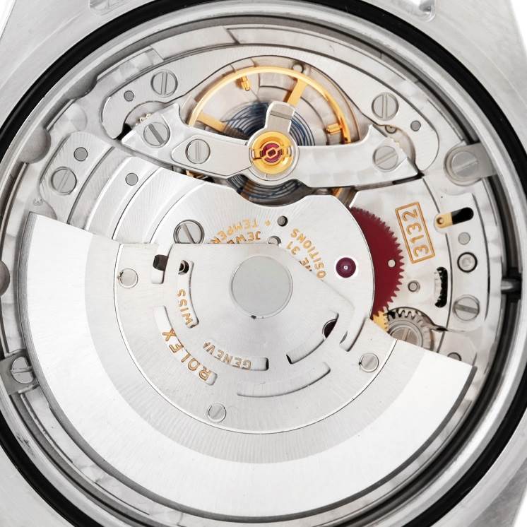 This image shows the movement and inner mechanism of a Rolex Explorer 214270 Men's Stainless Steel Black Dial 214270 Men's Stainless Steel Black Dial watch, viewed from the back.