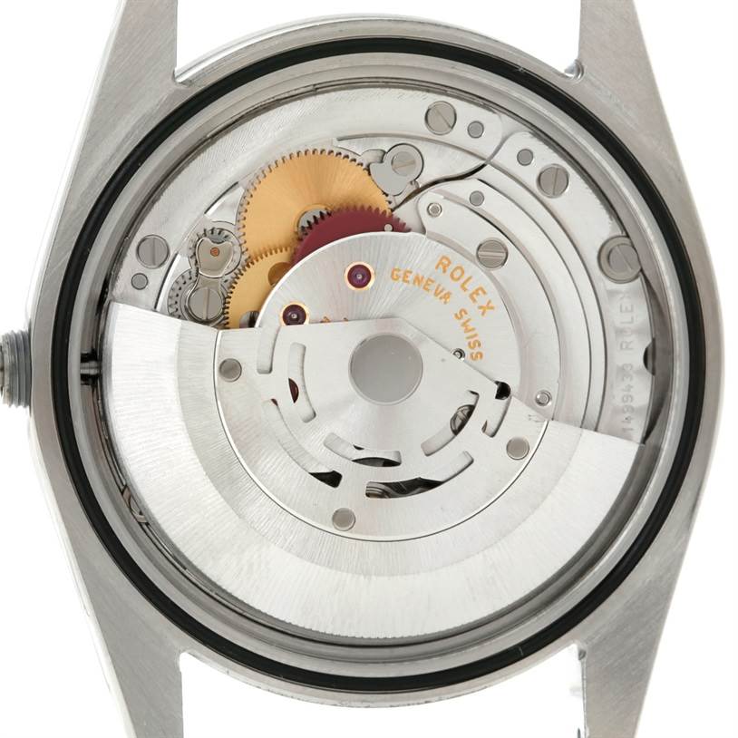 The image shows the internal mechanism of a Rolex Explorer 114270 Men's Stainless Steel Black Dial 114270 Men's Stainless Steel Black Dial model watch, viewed from the back.