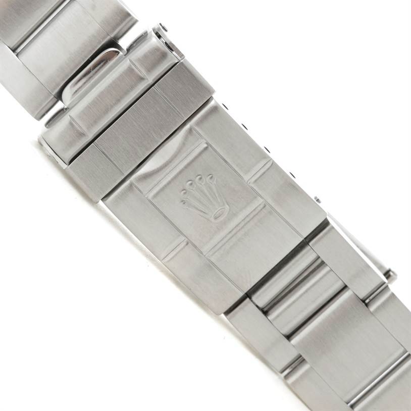 The image shows the clasp of a Rolex Explorer 114270 Men's Stainless Steel Black Dial 114270 Men's Stainless Steel Black Dial watch at a slight angle, highlighting the engraved Rolex logo.