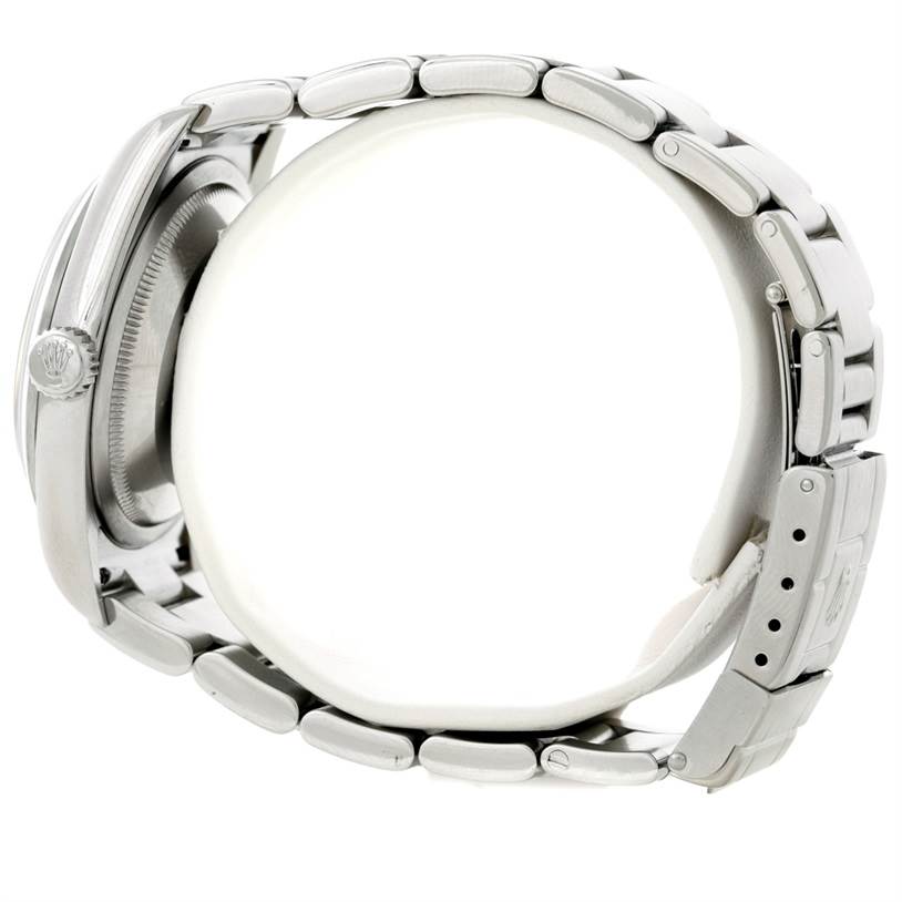 The image shows a side view of the Rolex Explorer 114270 Men's Stainless Steel Black Dial 114270 Men's Stainless Steel Black Dial watch, showcasing the bracelet, crown, and case back.