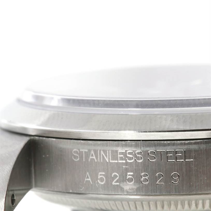 This close-up image shows the side of a Rolex Explorer 14270 Men's Stainless Steel Black Dial 14270 Men's Stainless Steel Black Dial watch, highlighting the stainless steel casing and model number.
